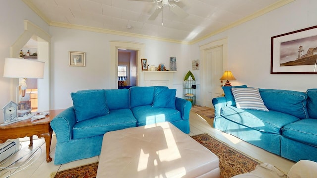 living room with crown molding, ceiling fan, a baseboard radiator, and light hardwood / wood-style floors