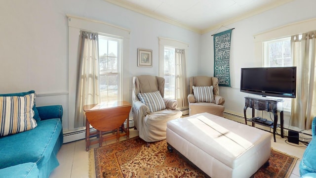 sitting room featuring baseboard heating and crown molding