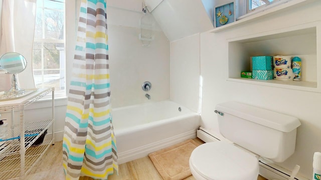 bathroom with shower / tub combo with curtain, wood-type flooring, a baseboard radiator, and a healthy amount of sunlight