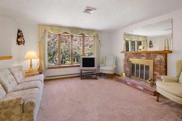 living room with a baseboard radiator, a brick fireplace, and carpet floors