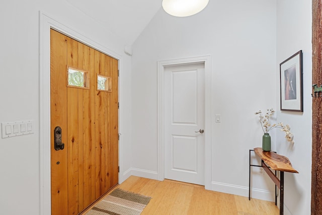 130 Daniels Dr, Wellfleet, MA 02667 - foyer with light wood finished floors and vaulted ceiling