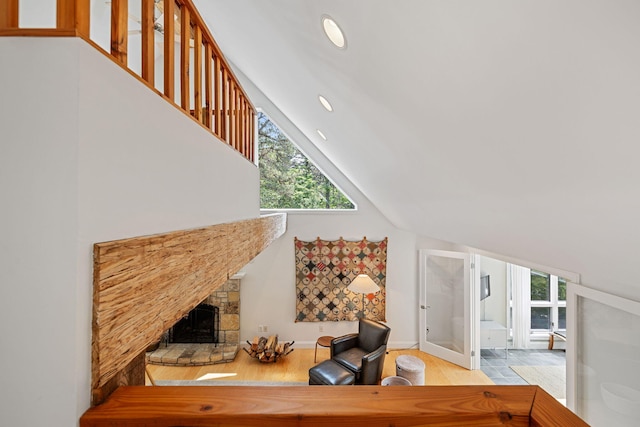 130 Daniels Dr, Wellfleet, MA 02667 - office featuring plenty of natural light, high vaulted ceiling, a fireplace, and wood finished floors