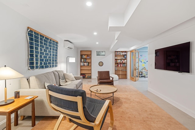 130 Daniels Dr, Wellfleet, MA 02667 - living area featuring a wall unit AC, recessed lighting, and built in features