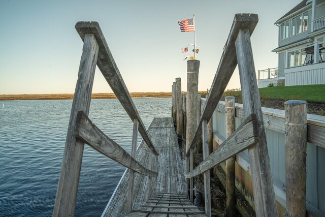 view of dock with a water view