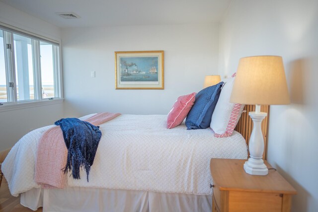 bedroom featuring visible vents