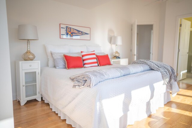 bedroom featuring wood finished floors