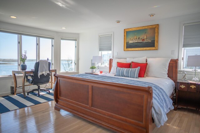 bedroom featuring recessed lighting and light wood-type flooring
