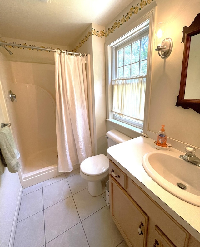 40 Appaloosa Way, Marstons Mills, MA 02648 - bathroom with toilet, vanity, tile patterned flooring, and a stall shower