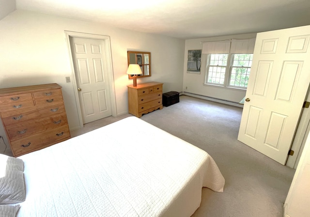 40 Appaloosa Way, Marstons Mills, MA 02648 - bedroom with light colored carpet and a baseboard radiator