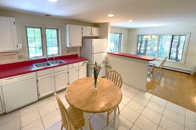 40 Appaloosa Way, Marstons Mills, MA 02648 - kitchen with white appliances, a sink, white cabinetry, healthy amount of natural light, and recessed lighting