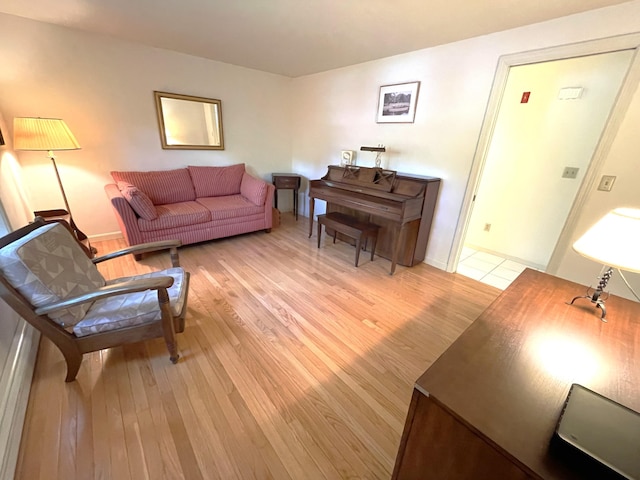 40 Appaloosa Way, Marstons Mills, MA 02648 - living room featuring light wood-type flooring and baseboards