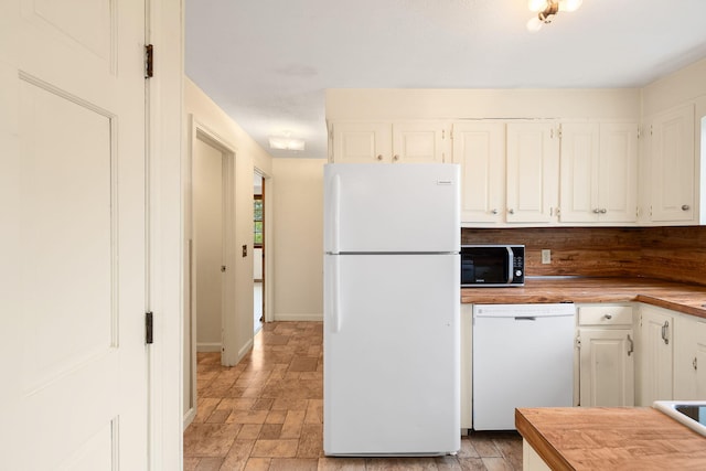 75 Wing Blvd E, East Sandwich, MA 02537 - kitchen featuring white appliances, white cabinetry, wood counters, and light stone finish flooring
