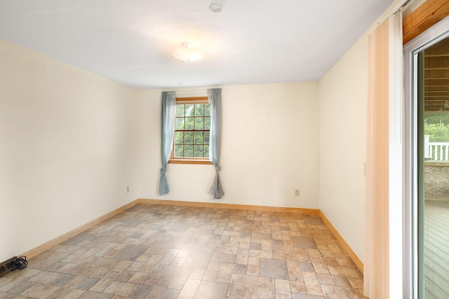 75 Wing Blvd E, East Sandwich, MA 02537 - empty room with stone finish floors and baseboards