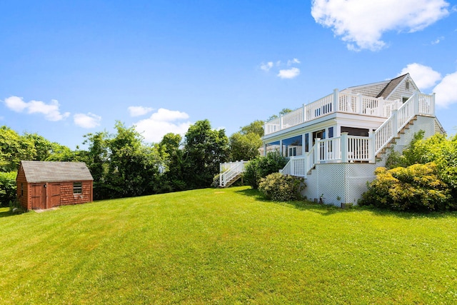 75 Wing Blvd E, East Sandwich, MA 02537 - view of grassy yard with stairs and a storage shed