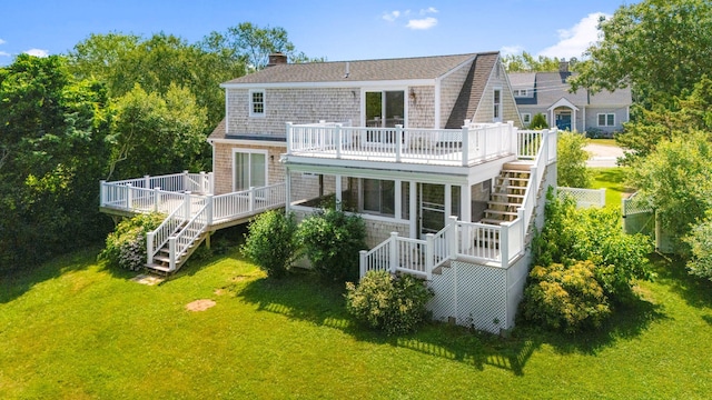 75 Wing Blvd E, East Sandwich, MA 02537 - back of property with stairs, a deck, and a yard