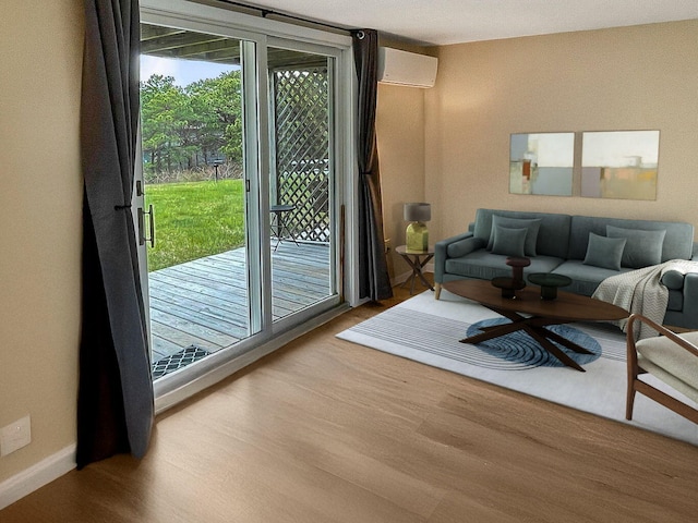 132 Shore Rd Unit 3, Truro, MA 02666 - doorway featuring an AC wall unit, wood finished floors, and baseboards