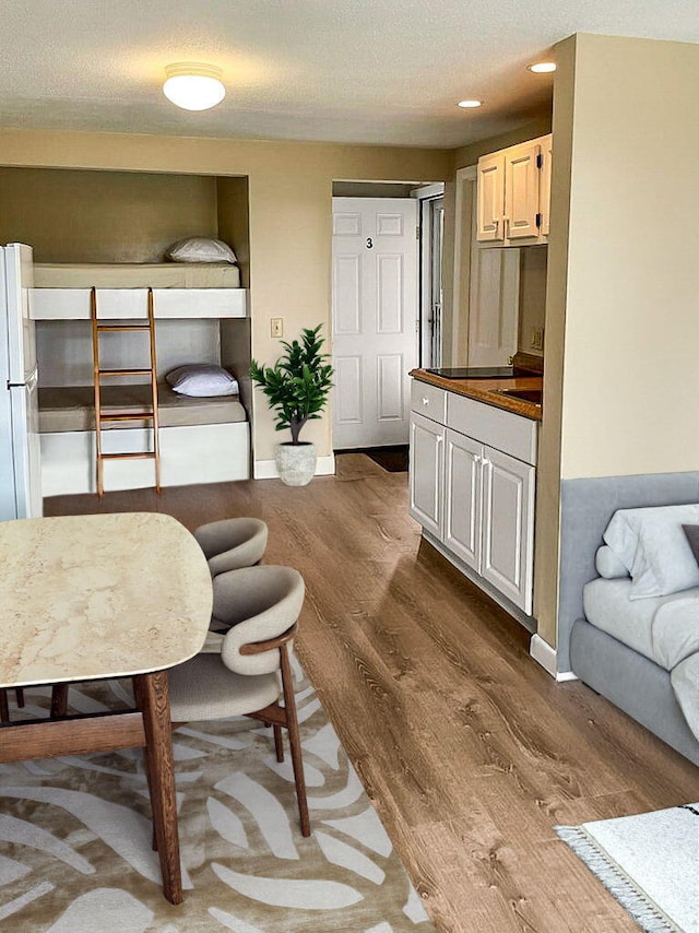 132 Shore Rd Unit 3, Truro, MA 02666 - living area featuring wood finished floors, baseboards, and recessed lighting