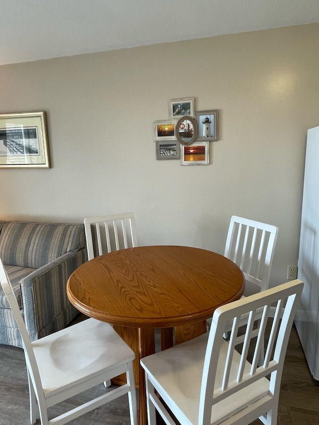 132 Shore Rd Unit 3, Truro, MA 02666 - dining space featuring wood finished floors