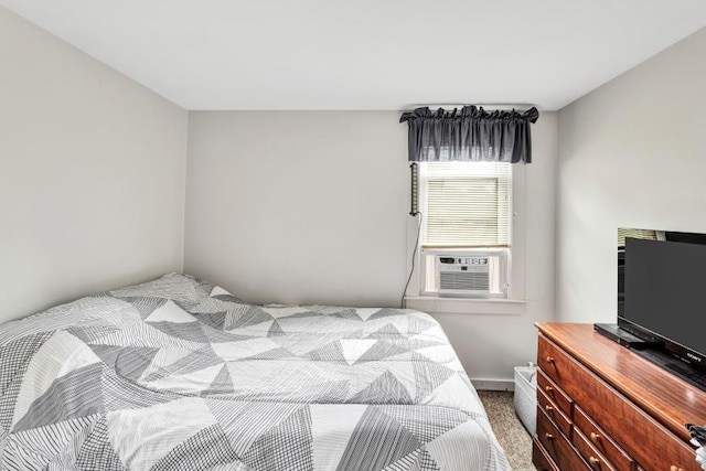 carpeted bedroom with cooling unit