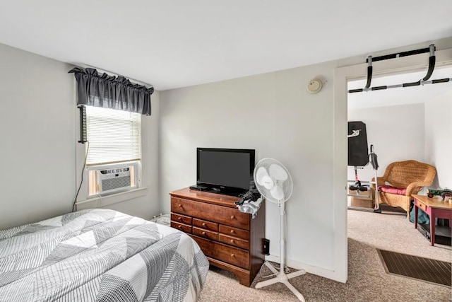 bedroom with carpet flooring and cooling unit