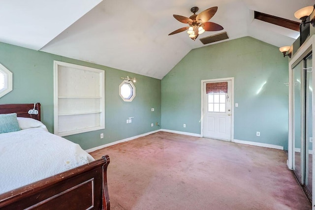 unfurnished bedroom featuring lofted ceiling, baseboards, carpet floors, and ceiling fan