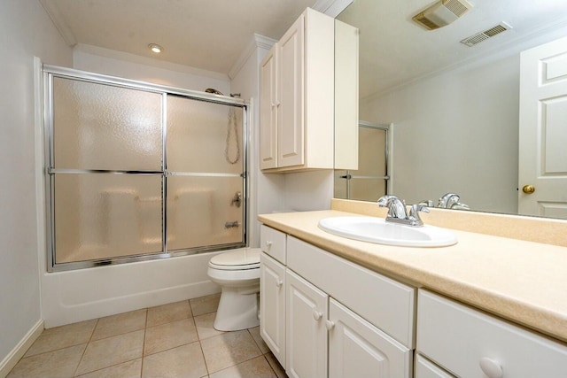 bathroom with tile patterned flooring, visible vents, crown molding, and toilet