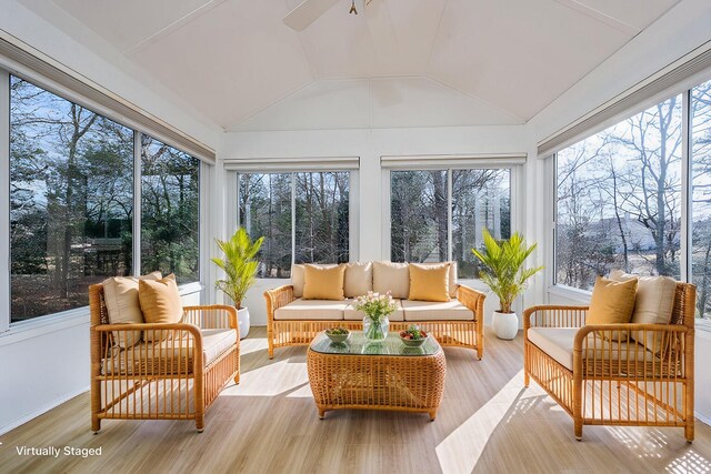 unfurnished room featuring light wood-type flooring, baseboards, ornamental molding, and a ceiling fan