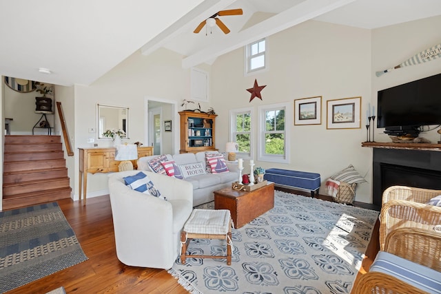 63 Briar Spring Rd, Orleans, MA 02653 - living room with ceiling fan, stairway, high vaulted ceiling, beam ceiling, and wood finished floors