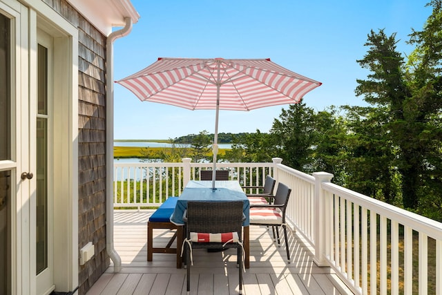 63 Briar Spring Rd, Orleans, MA 02653 - deck with outdoor dining space and a water view