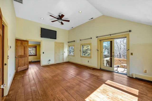 unfurnished living room with a ceiling fan, wood-type flooring, high vaulted ceiling, and baseboards