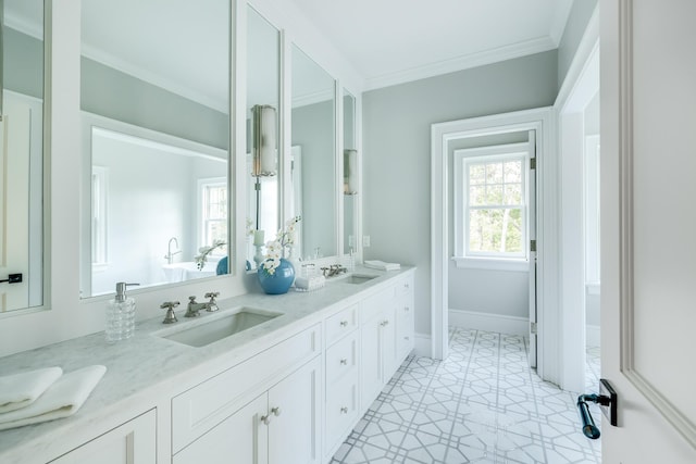 71 Towhee Ln, Orleans, MA 02653 - full bathroom featuring crown molding, double vanity, a sink, and tile patterned flooring