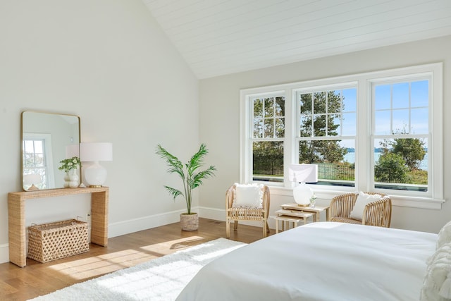 71 Towhee Ln, Orleans, MA 02653 - bedroom featuring baseboards, wood finished floors, and vaulted ceiling