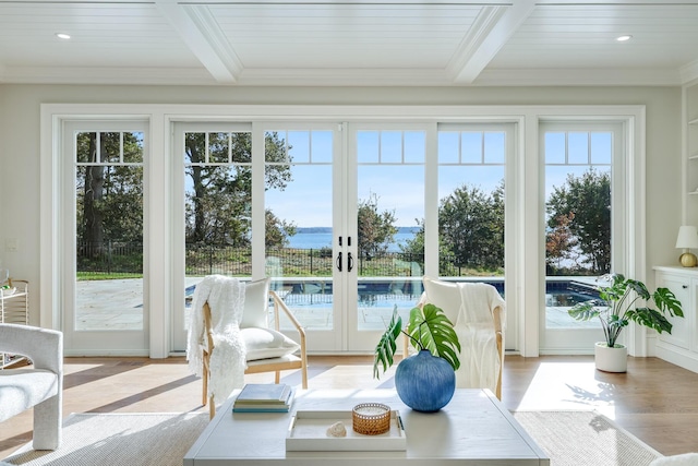 71 Towhee Ln, Orleans, MA 02653 - sunroom with beam ceiling, plenty of natural light, and french doors