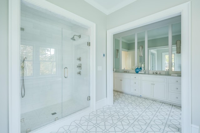 71 Towhee Ln, Orleans, MA 02653 - full bathroom featuring double vanity, baseboards, a shower stall, and a sink