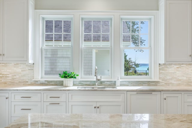 71 Towhee Ln, Orleans, MA 02653 - interior space featuring a sink and tasteful backsplash