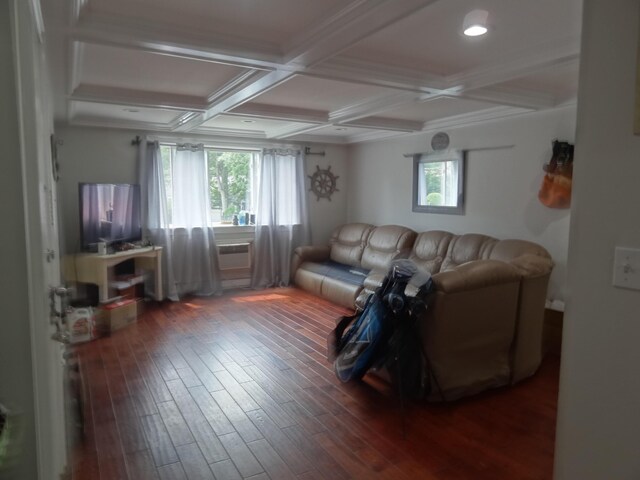 living room with coffered ceiling, beamed ceiling, crown molding, and hardwood / wood-style flooring