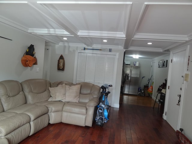 living room with coffered ceiling, beamed ceiling, and dark hardwood / wood-style flooring