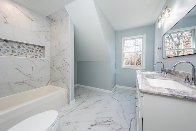 bathroom with double vanity, marble finish floor, baseboards, and a sink