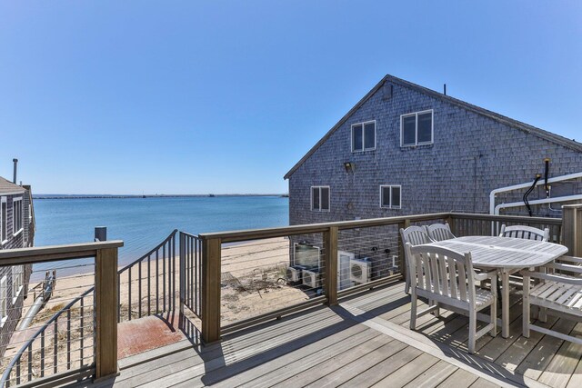 deck featuring a water view