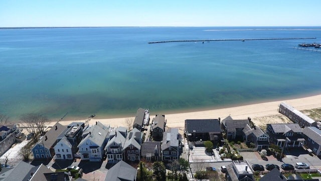 bird's eye view with a water view and a view of the beach