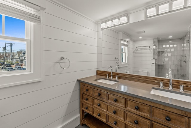 bathroom with wood walls, plenty of natural light, and walk in shower