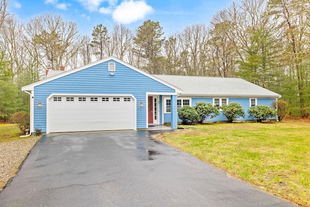 49 Heather Ln, Centerville, MA 02632 - single story home with a front yard, a chimney, an attached garage, and aphalt driveway