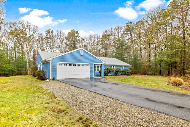 49 Heather Ln, Centerville, MA 02632 - ranch-style house with aphalt driveway, a front yard, a chimney, and an attached garage