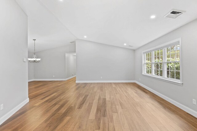 49 Heather Ln, Centerville, MA 02632 - unfurnished room featuring a chandelier, light wood finished floors, visible vents, and baseboards