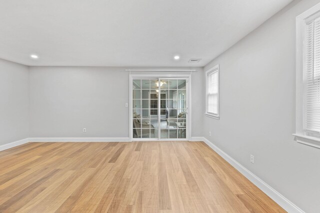 49 Heather Ln, Centerville, MA 02632 - unfurnished room featuring visible vents, baseboards, light wood-type flooring, and recessed lighting