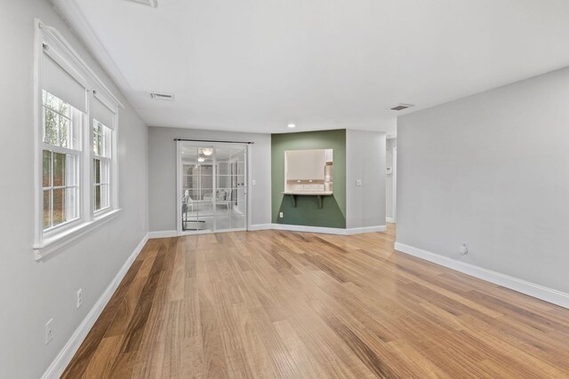 49 Heather Ln, Centerville, MA 02632 - empty room featuring light wood-style flooring, baseboards, and visible vents