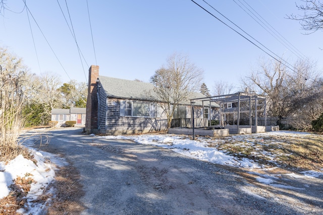 view of front of property with a chimney