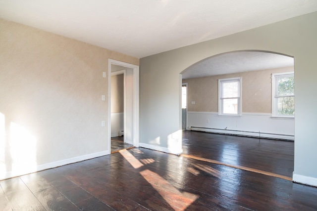 62 Windsor Rd, Sandwich, MA 02563 - unfurnished room featuring a baseboard radiator and dark hardwood / wood-style flooring