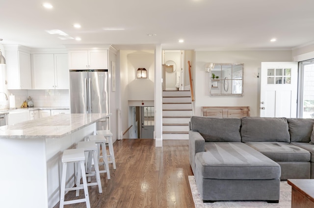 living room with light hardwood / wood-style floors