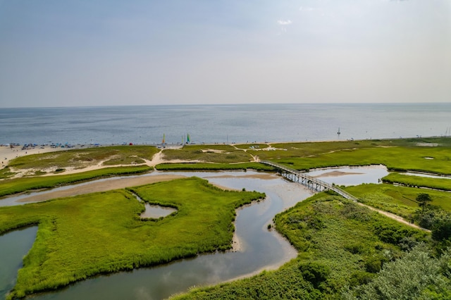 view of community with a water view